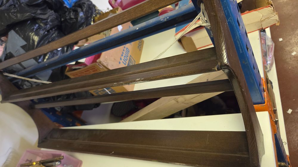 Lot 273 – A Stained Wood Three-Tier Wall Mounted Plate Rack