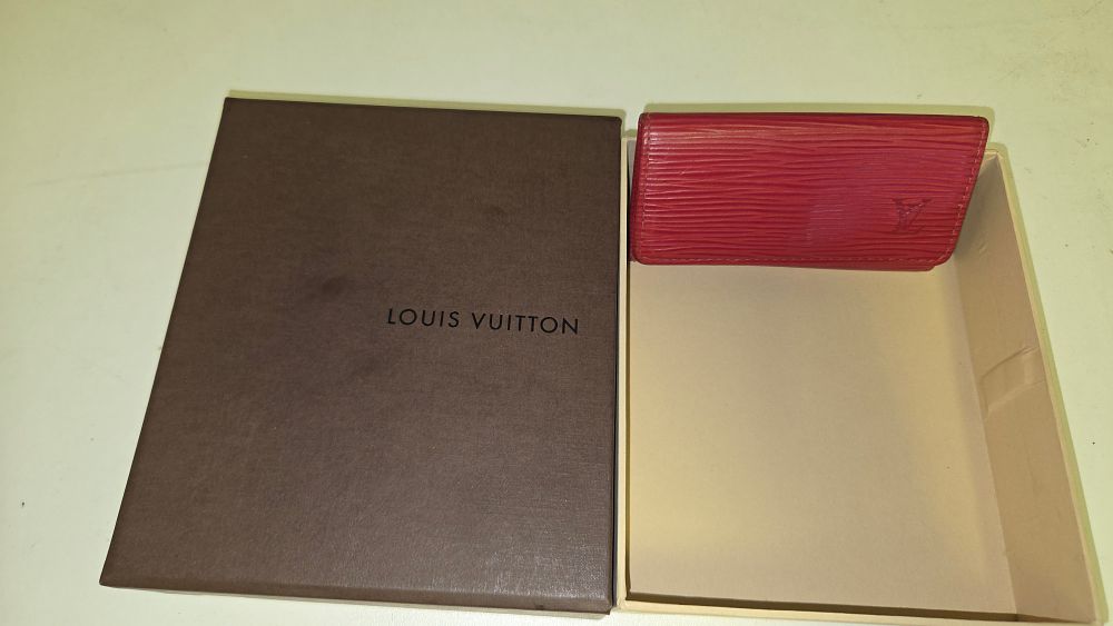 Lot 311 – Louis Vuitton Red Epi Leather 4-Hook Key Holder and Presentation Box