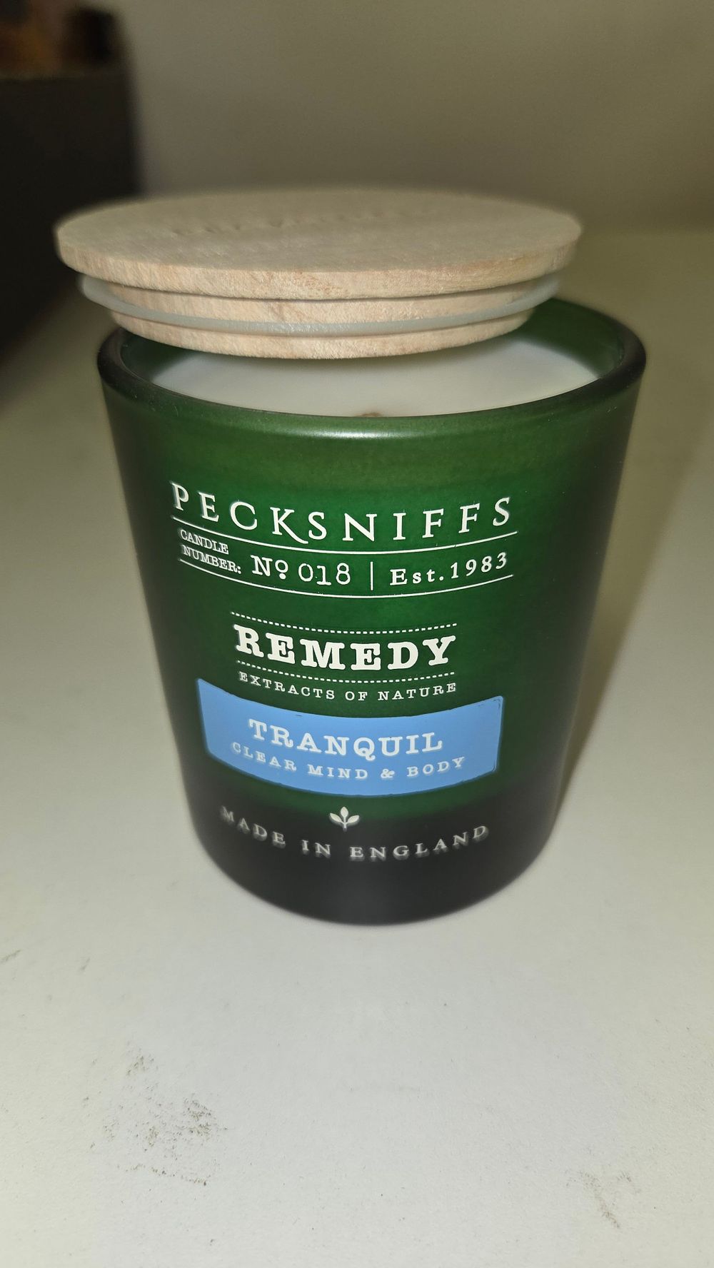 Lot 323 – Pecksniff’s Remedy No. 018 Tranquil Fragranced Jar Candle 7oz