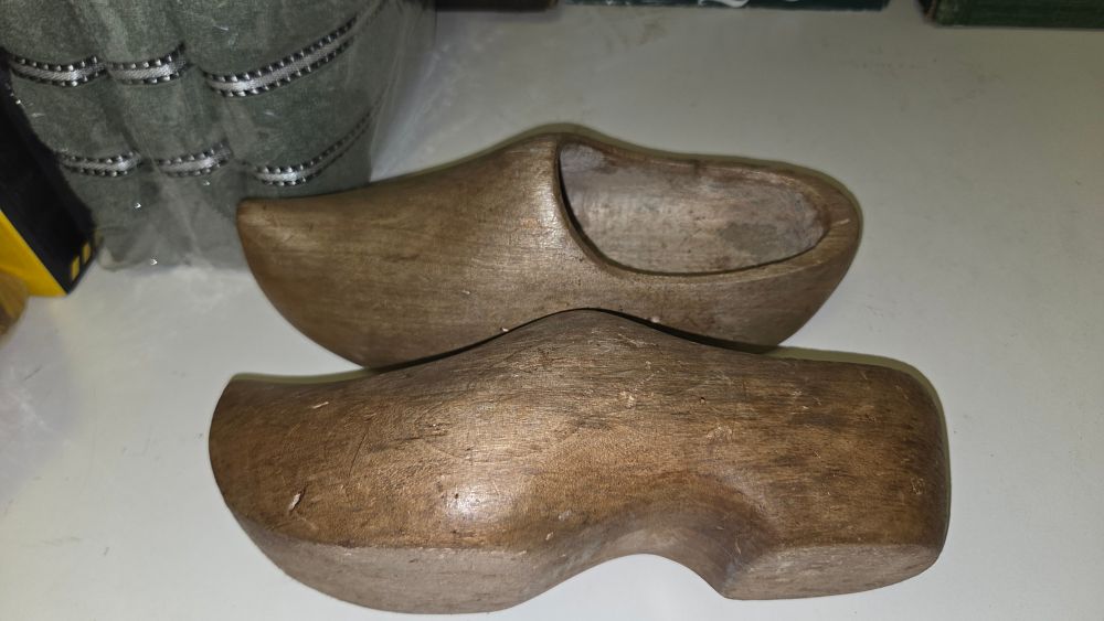 Lot 333 – A Pair of Traditional Hand-Carved Wooden Clogs