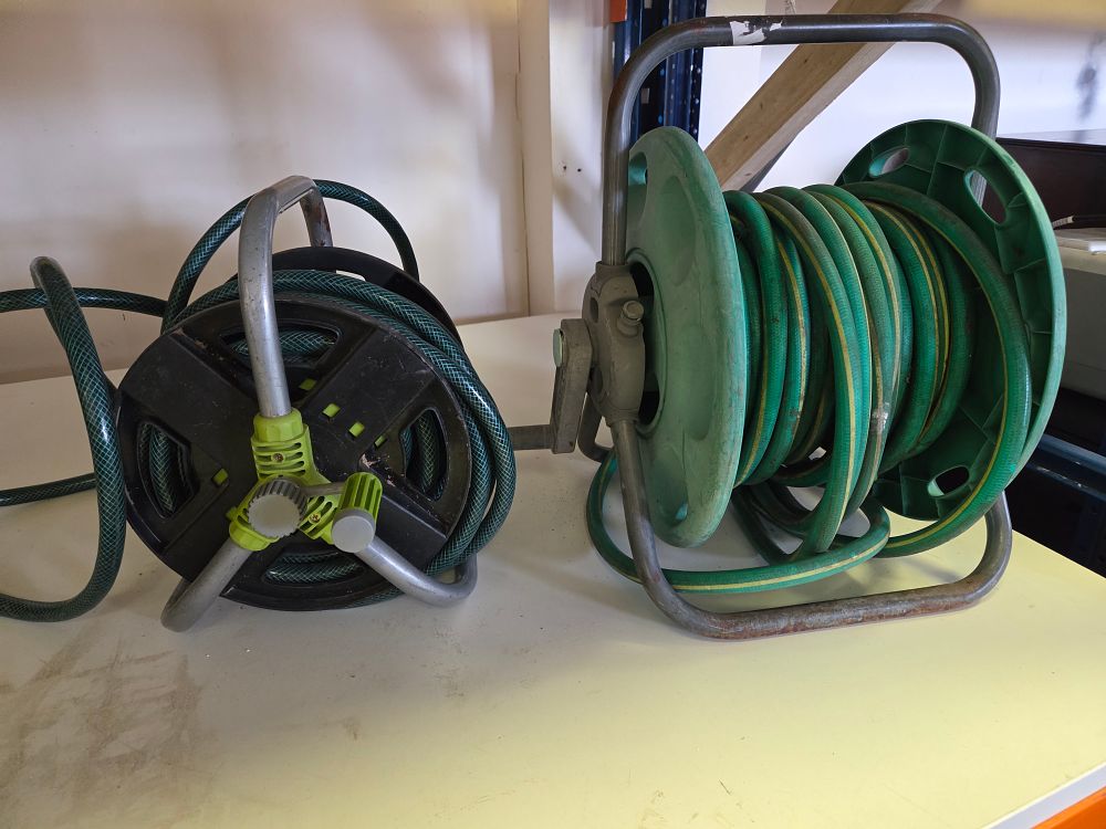 Lot 359 – Two Portable Garden Hose Reels with Hoses