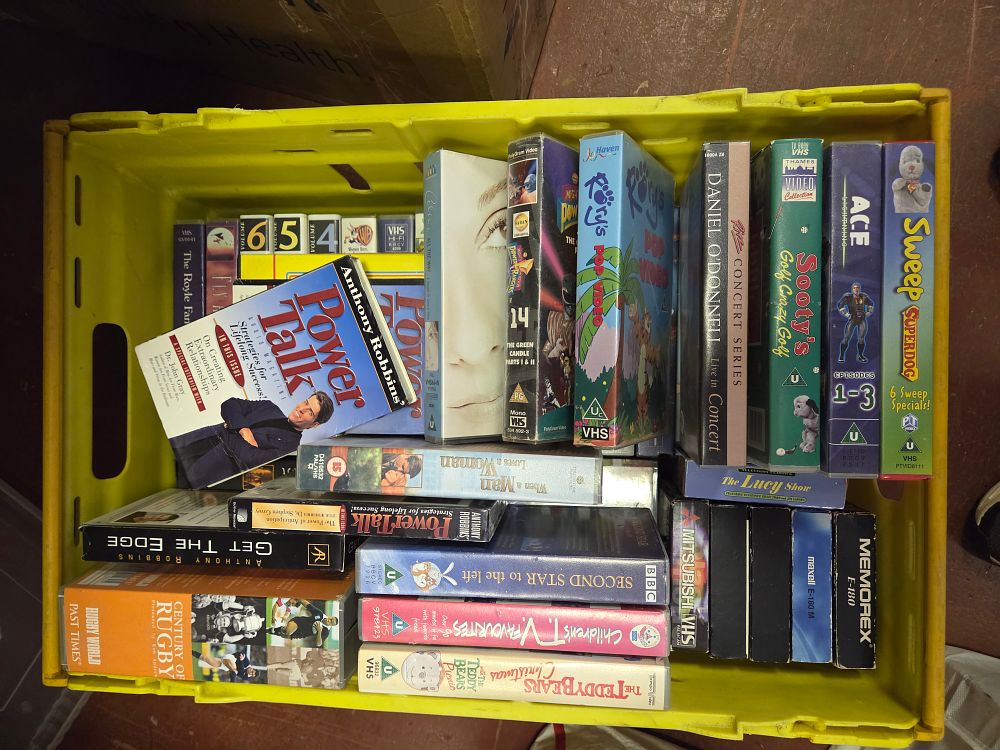 Lot 360 – An Assortment of Approximately 25 VHS Video Tapes including Childrens, Motivational, and Music Titles
