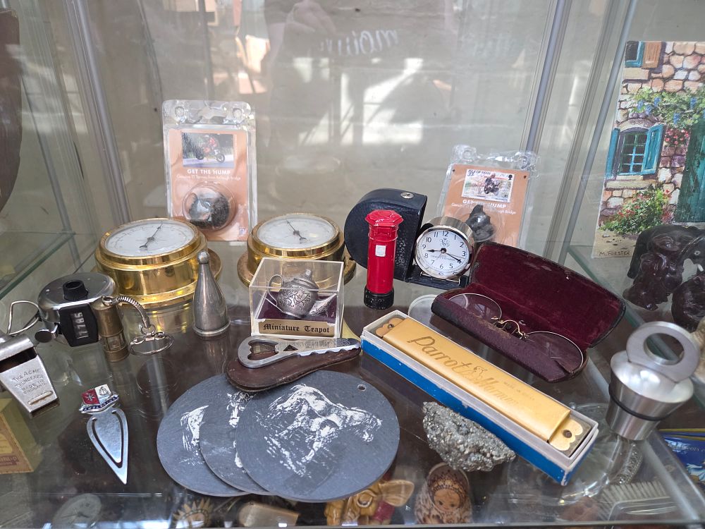 Lot 618 – An Assortment of Small Antiques and Collectibles including Scientific Instruments, Souvenirs, and Musical Instruments