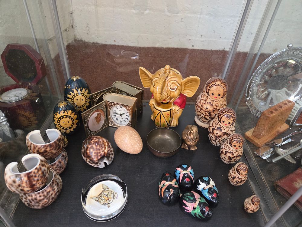 Lot 619 – A Collection of Decorative Objects and Collectibles including Matryoshka Nesting Dolls and Europa Travel Clocks