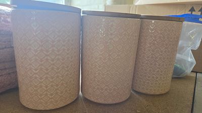 A Trio of Morrisons Blush Pink Embossed Ceramic Storage Jars with Wooden Lids