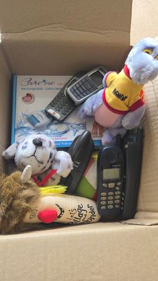 An Assortment of Vintage Nokia Mobile Telephones, Disney Figment Plush Toy, and Miscellaneous 