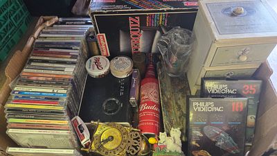 A Collection of Vintage Games Music CDs and Decorative Items