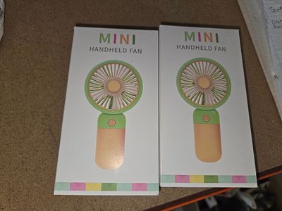 A Pair of Mini Handheld Rechargeable Fans