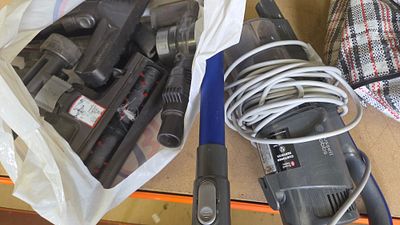 A Russell Hobbs Corded Handheld Vacuum Cleaner Set and Accessories