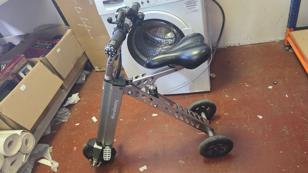Lot 217 – Microhenry Folding Three-Wheeled Electric Scooter