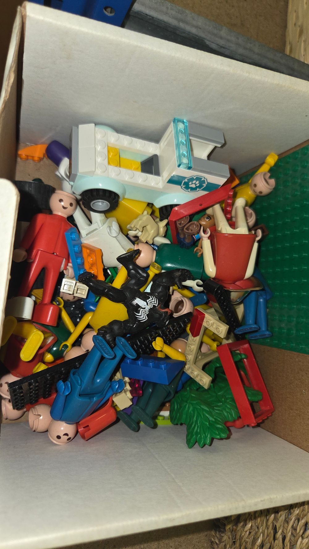 Lot 159 – A Collection of Playmobil Figures, LEGO Building Components, and a Marvel Venom Action Figure