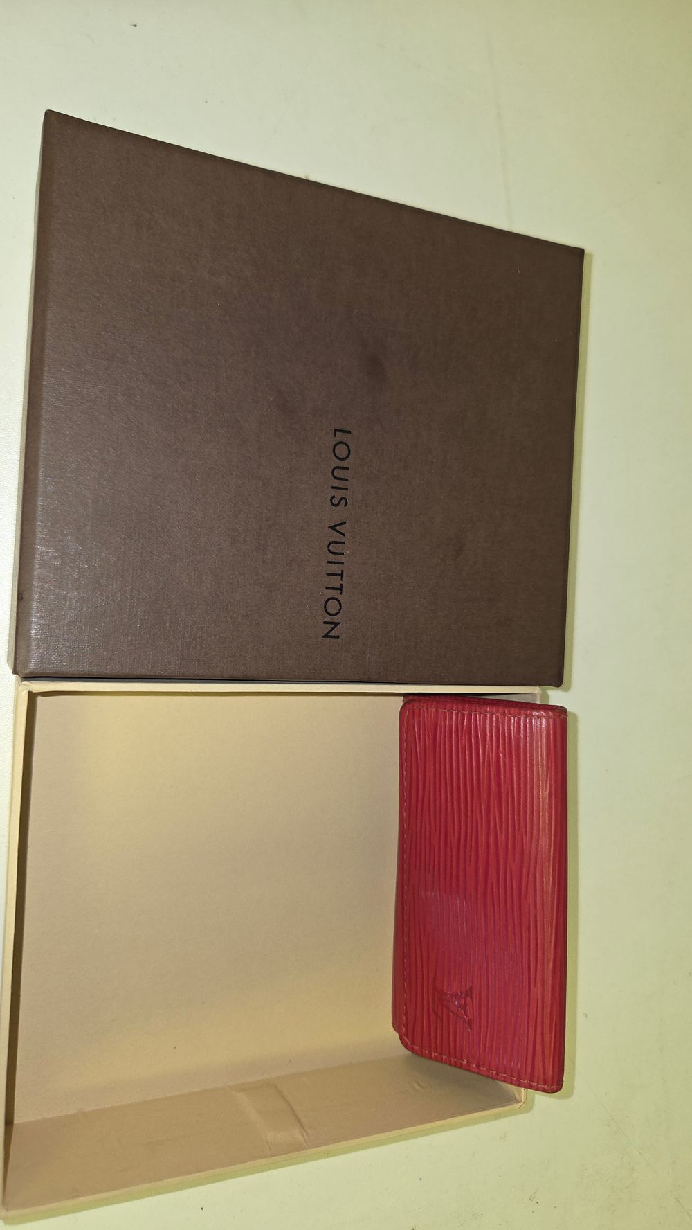 Lot 160 – Louis Vuitton Red Epi Leather 4-Hook Key Holder and Presentation Box