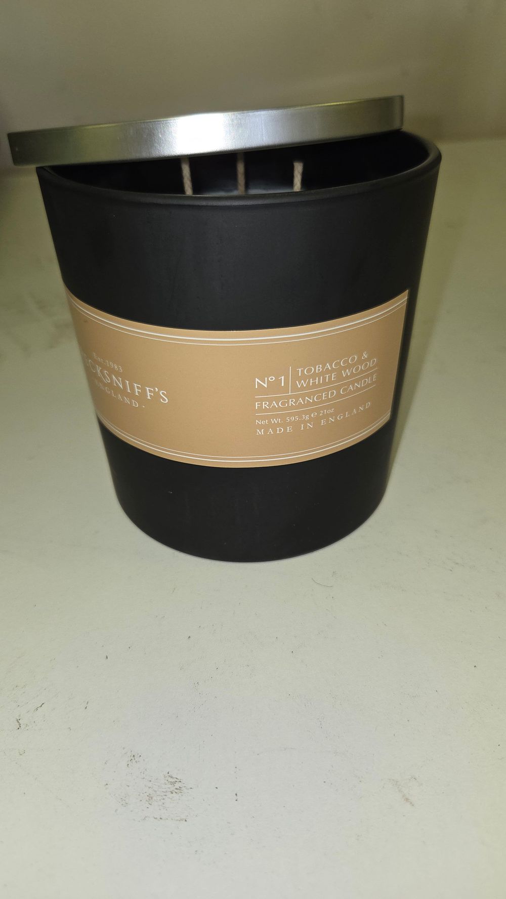Lot 163 – Pecksniff’s England No. 1 Tobacco and White Wood Three-Wick Fragranced Jar Candle 19.4oz
