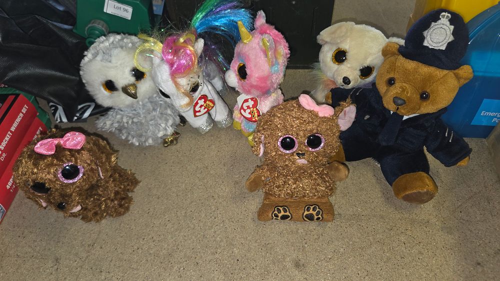Lot 166 – A Collection of Ty Beanie Boos and a Police Themed Teddy Bear