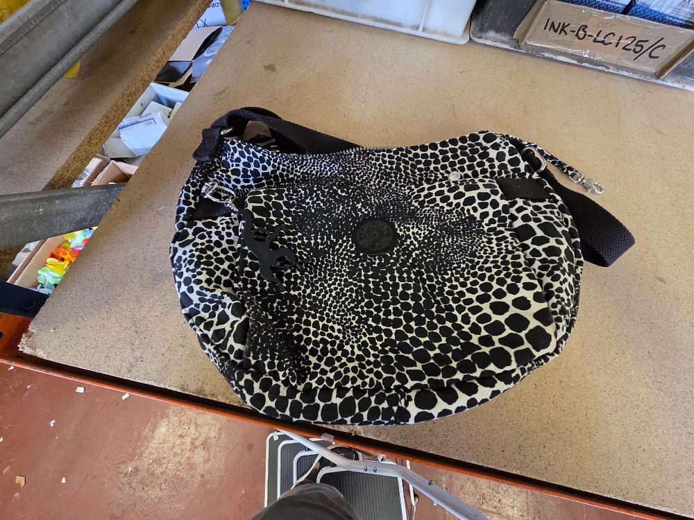 Lot 255 – Kipling Velda Crossbody Bag in Black and White Animal Print