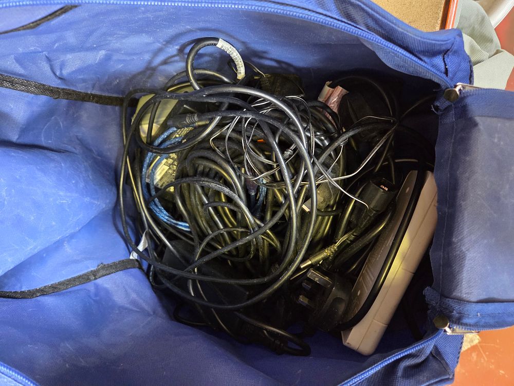 Lot 299 – An Assortment of Electronic Power Cables, Adapters, and Accessories