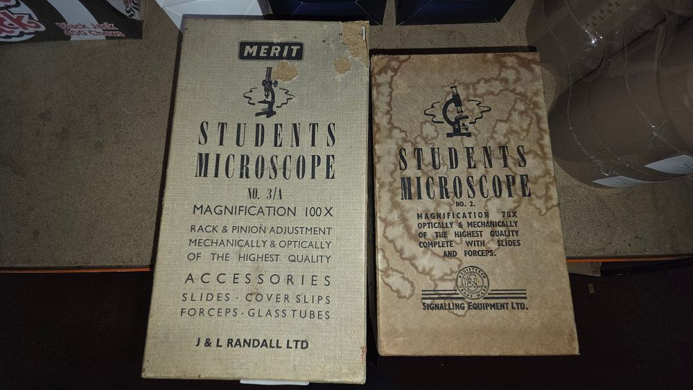 Lot 301 – Two Boxed Mid Century microscopes by S.E.L. and Merit