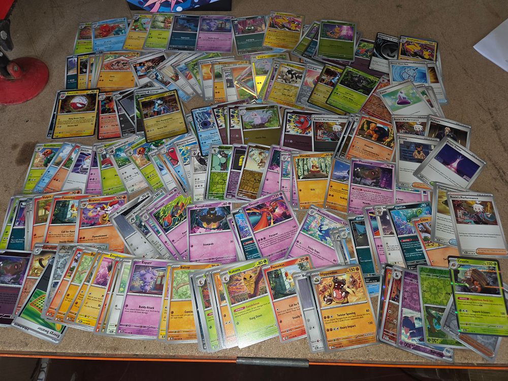 Lot 317 – A Collection of English Pokémon Trading Card Game Cards Primarily from the Scarlet and Violet Paradox Rift Expansion