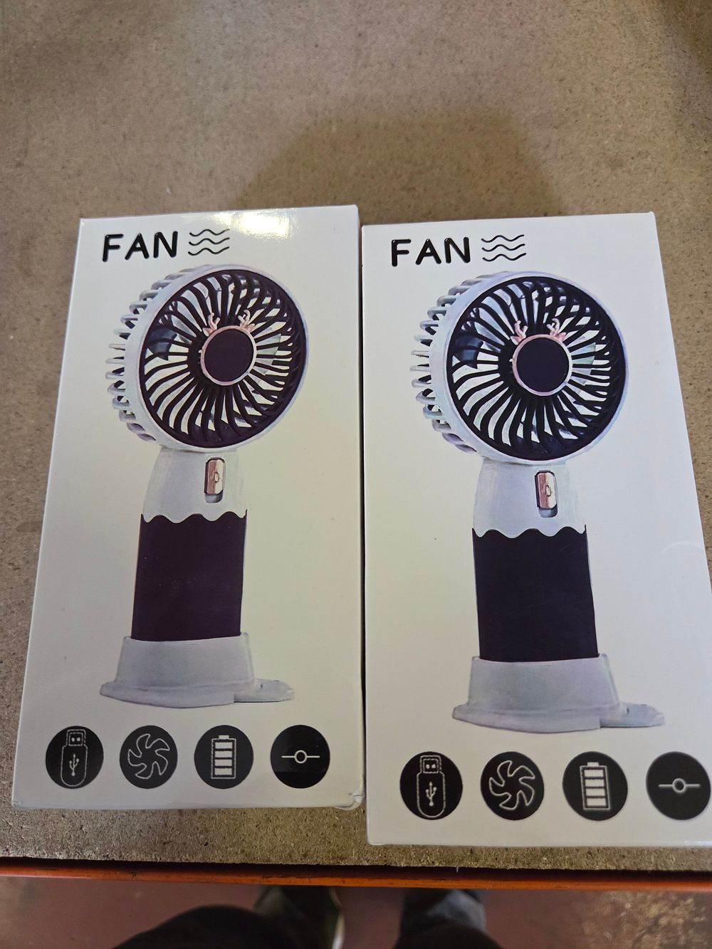 Lot 359 – A Pair of Portable USB Rechargeable Handheld Fans