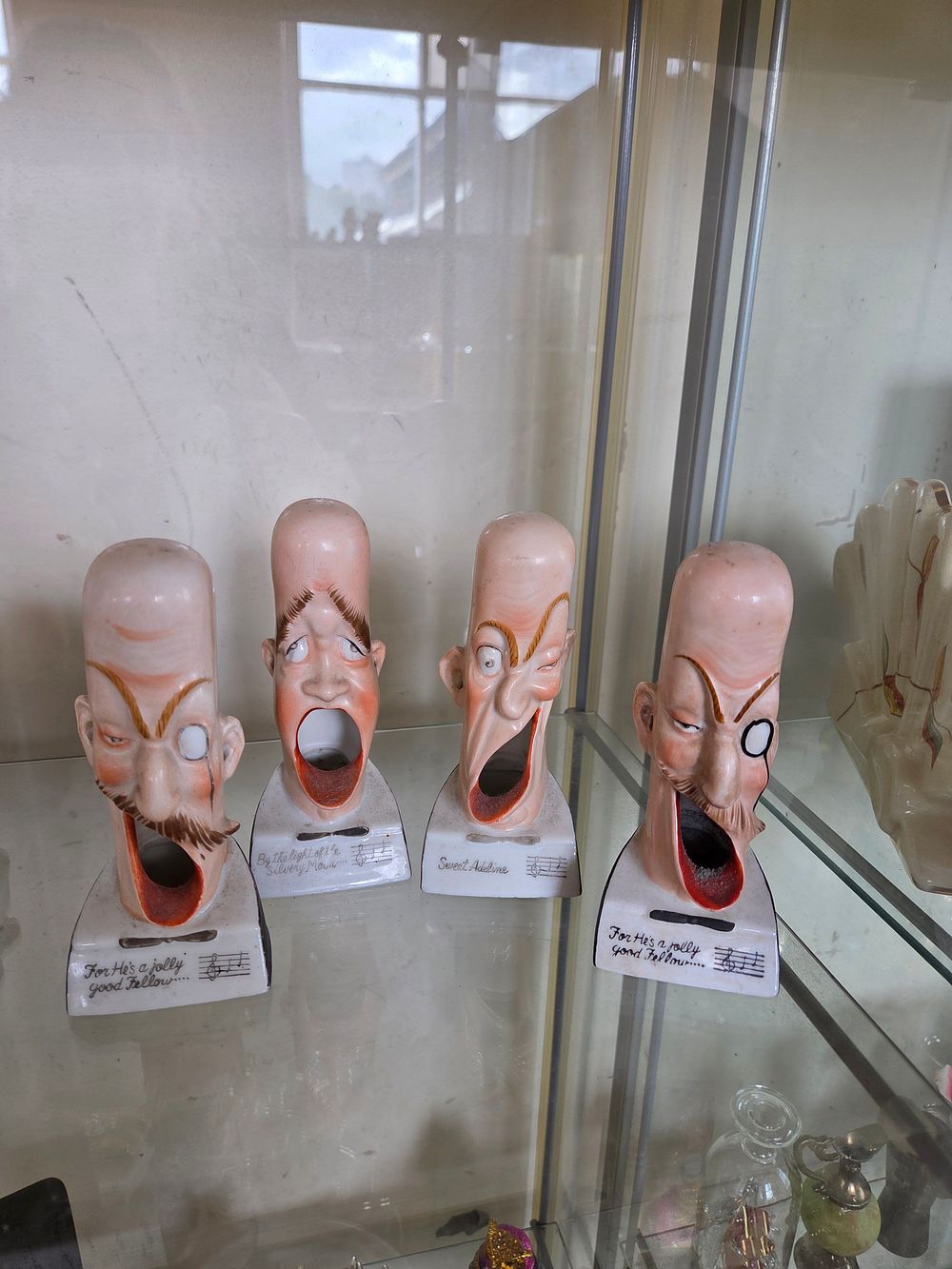 Lot 603 – A Set of Schafer and Vater Ceramic Singing Quartet Smoking Head Ashtrays