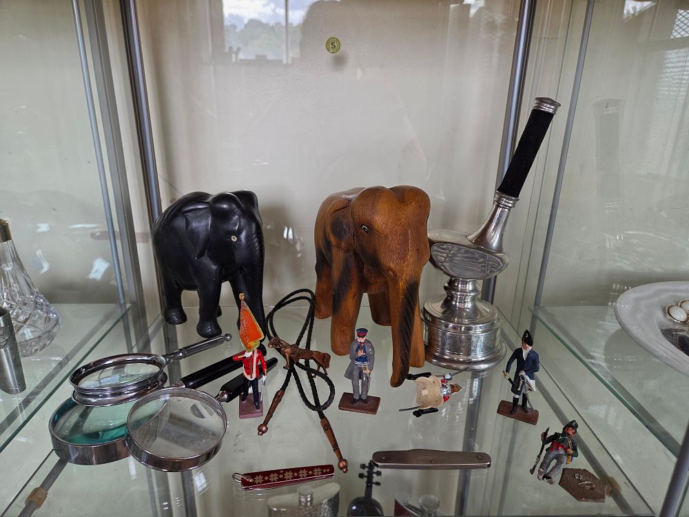 Lot 615 – A Collection of Miscellaneous Collectibles Including Carved Wooden Elephants, Miniature Toy Soldiers, and a Presentation Trophy