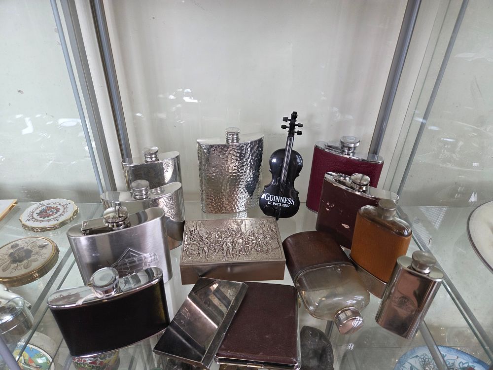 Lot 616 – A Collection of Vintage Hip Flasks, Cigarette Cases, and a Guinness St. Patrick’s 2002 Novelty Violin