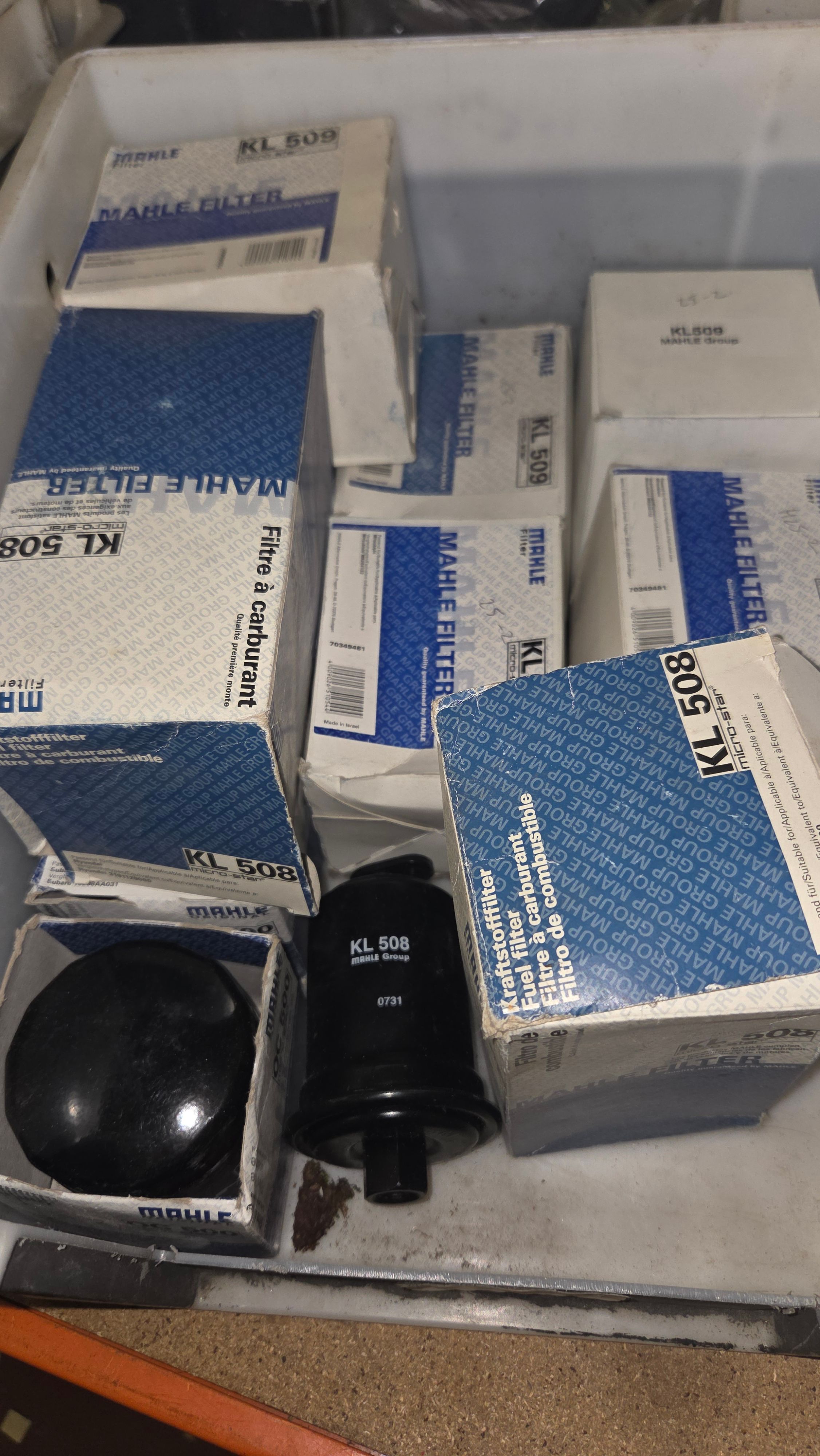 An Assortment of MAHLE Automotive Fuel and Oil Filters Including KL 508 and KL 509