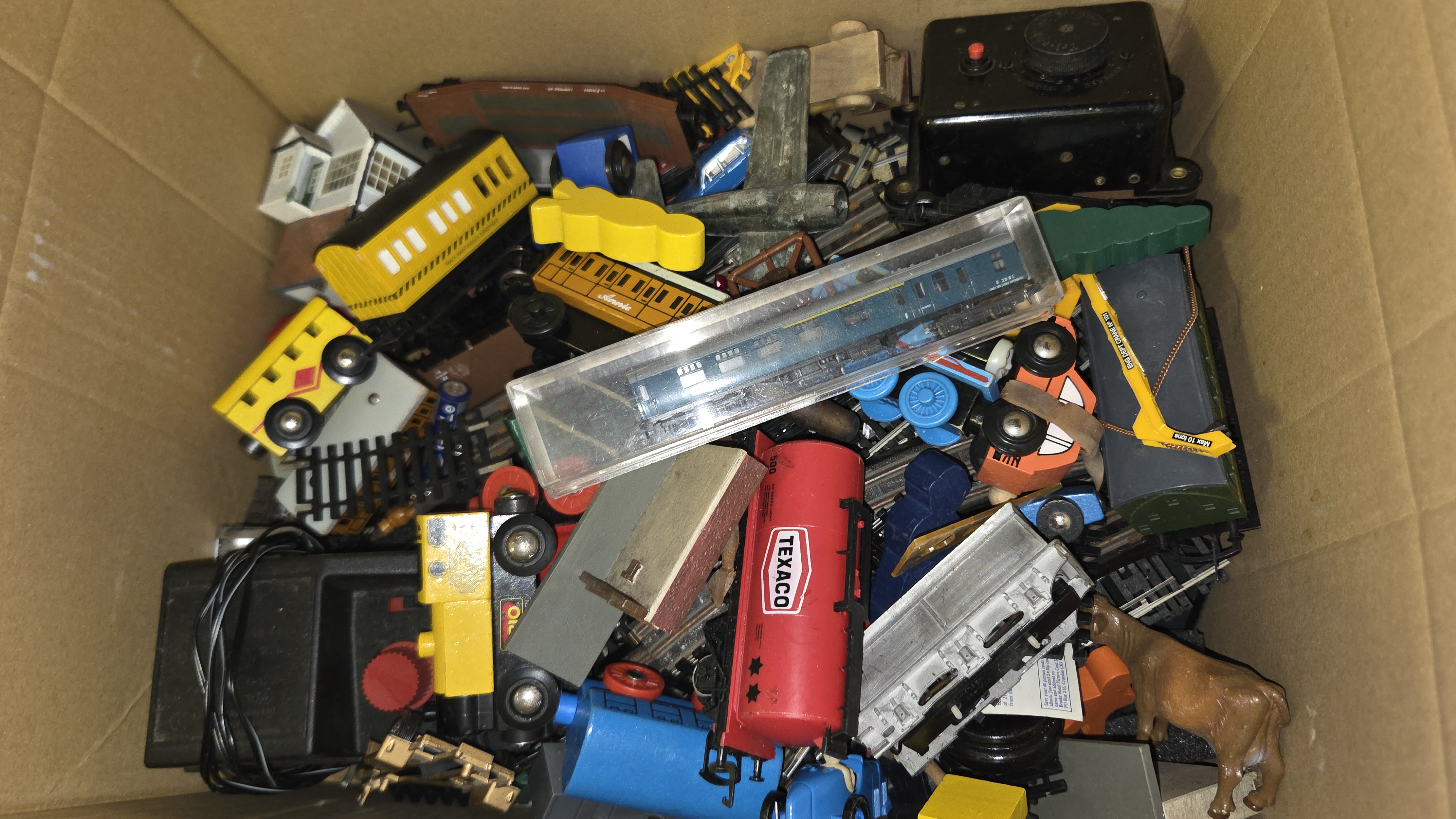 An Assortment of Toy Trains and Accessories including Thomas & Friends Wooden Railway and Model Rail Components