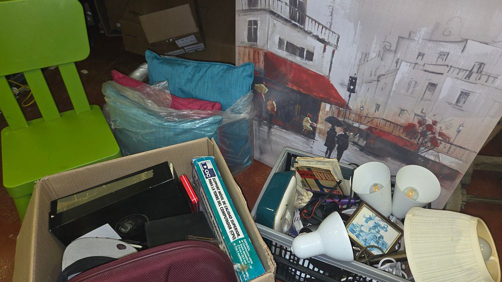Lot 152 – Two Boxes of Mixed Household Goods, Textiles, and Decorative Items including a New Era Cap and DAC CPU Stand