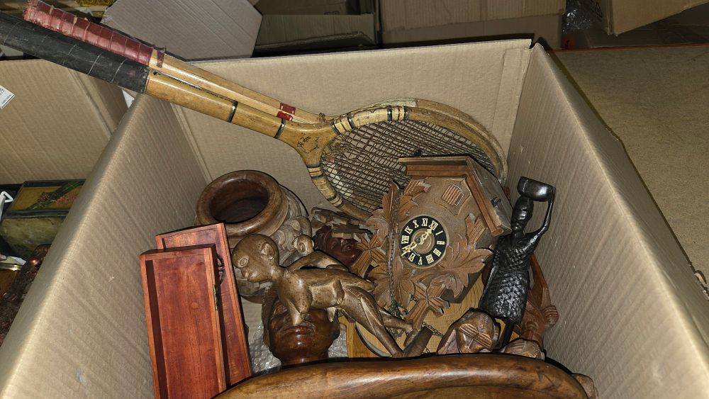 Lot 180 – A Collection of Vintage Wooden Tennis Rackets, a German Cuckoo Clock, and Hand-Carved Decorative Items