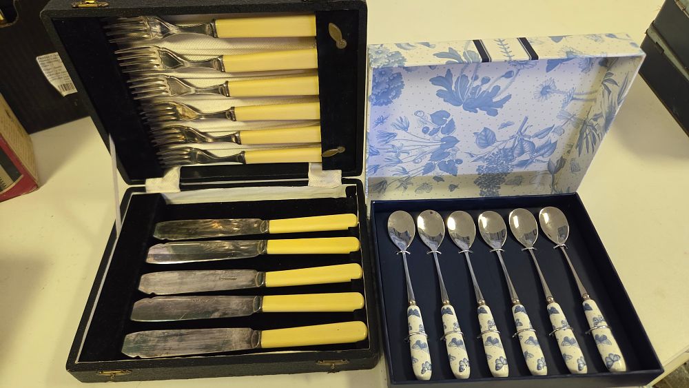 Lot 201 – Two Boxed Flatware Sets comprising a Cased Dessert Service and a Set of Ceramic Handled Spoons
