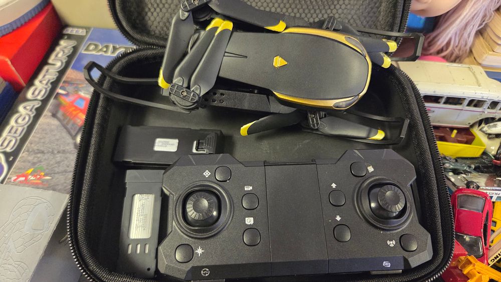 Lot 211 – S6 Foldable Quadcopter Drone with Remote Controller and Carrying Case