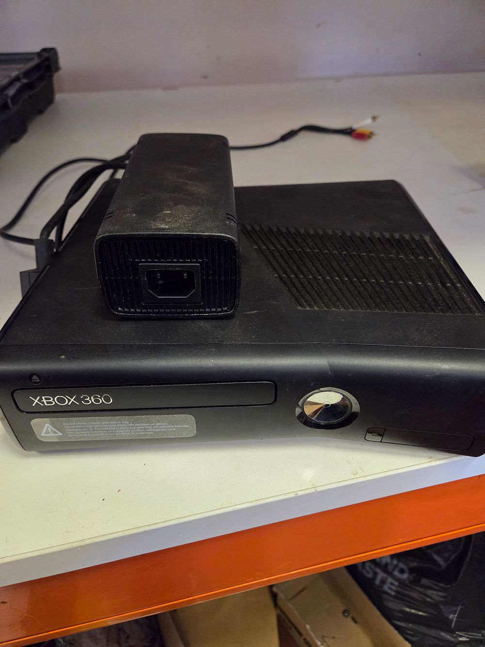 Lot 313 – Microsoft Xbox 360 S Video Game Console with Power Supply and AV Cable