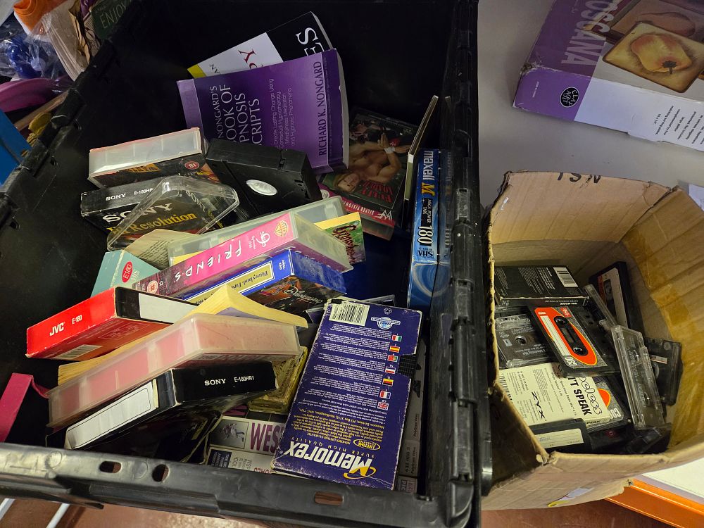 Lot 370 – A Collection of VHS Tapes, Audio Cassettes, and Printed Ephemera