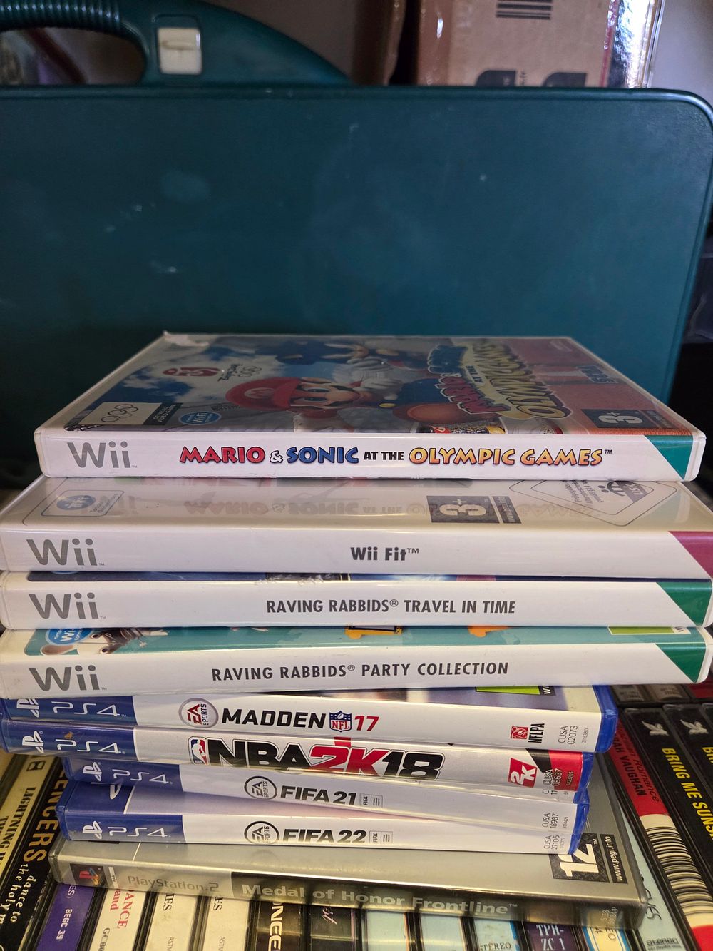 Lot 390 – A Collection of Eight Nintendo Wii and Sony PlayStation 4 Video Games