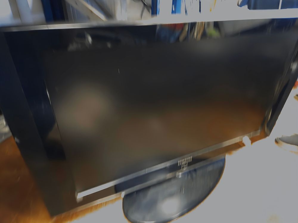 Lot 396 – Samsung LE37S86BD 37-Inch HD Ready LCD Television with Stand powers on