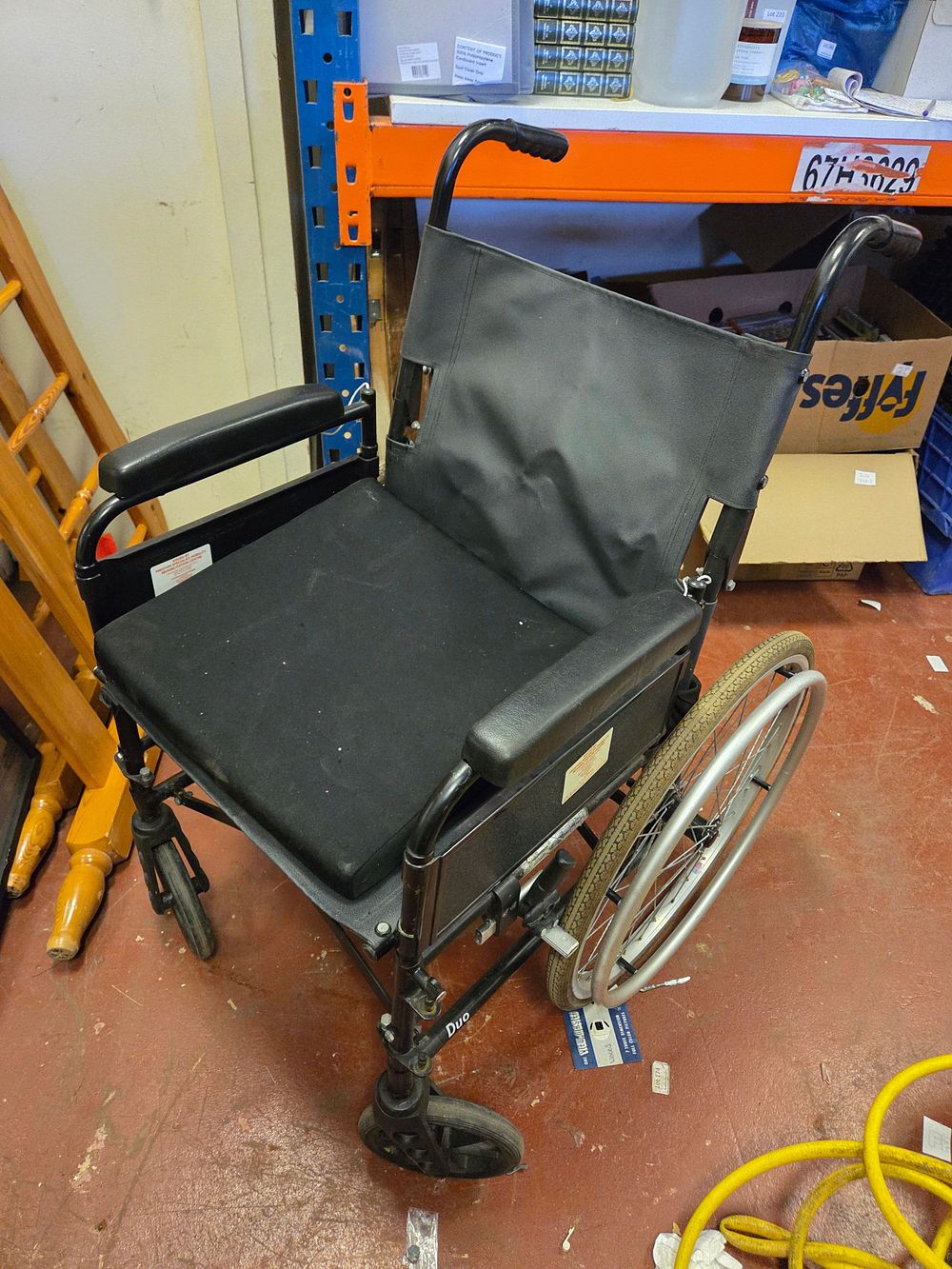 Lot 405 – A Duo Manual Wheelchair with Black Padded Upholstery