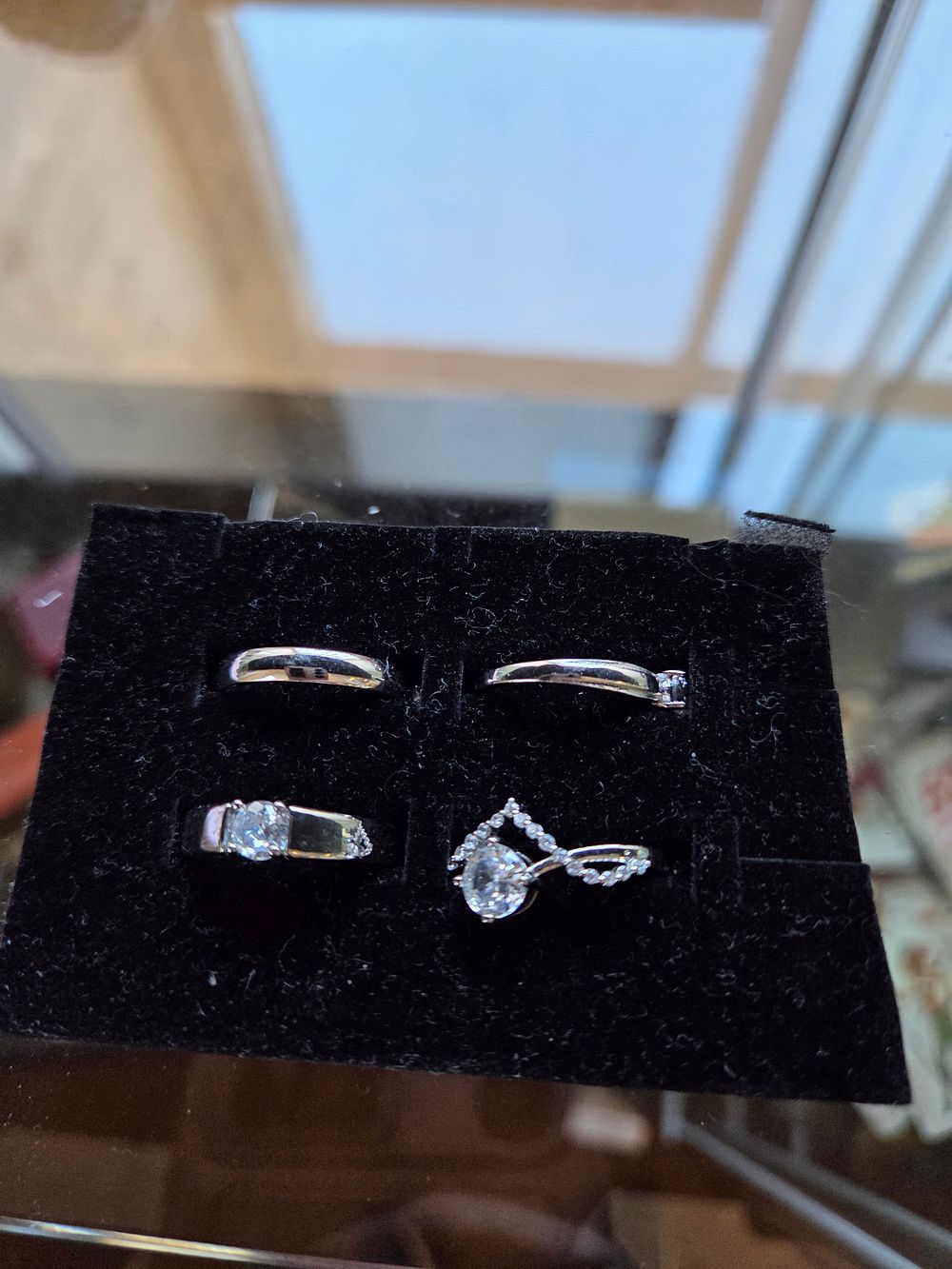 Lot 608 – Four Silver Rings 8.46g