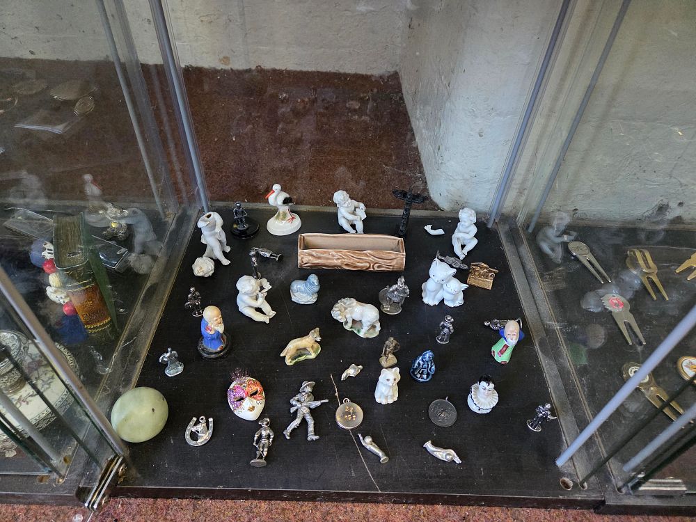 Lot 621 – An Assortment of Miniature Porcelain and White Metal Figurines and Curiosities including Wade Whimsies