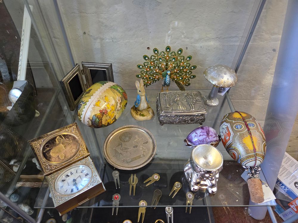 Lot 624 – A Collection of Vintage and Decorative Curios Including a Europa Travel Clock and Figurines