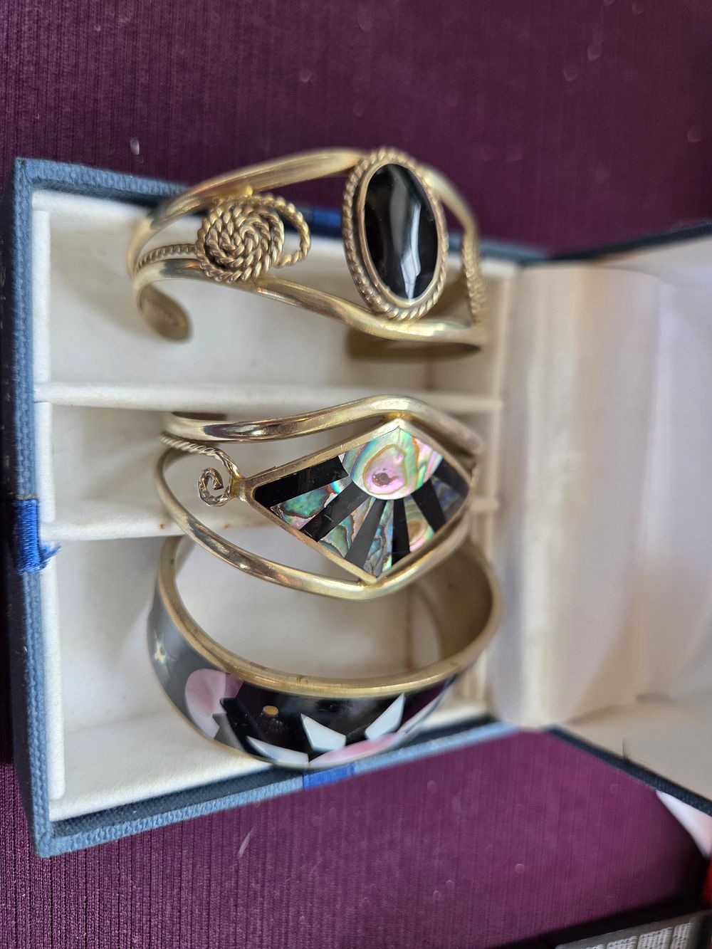 Lot 650 – A Trio of Vintage Mexican Silver and Abalone Shell Inlay Cuff Bracelets 53.89g