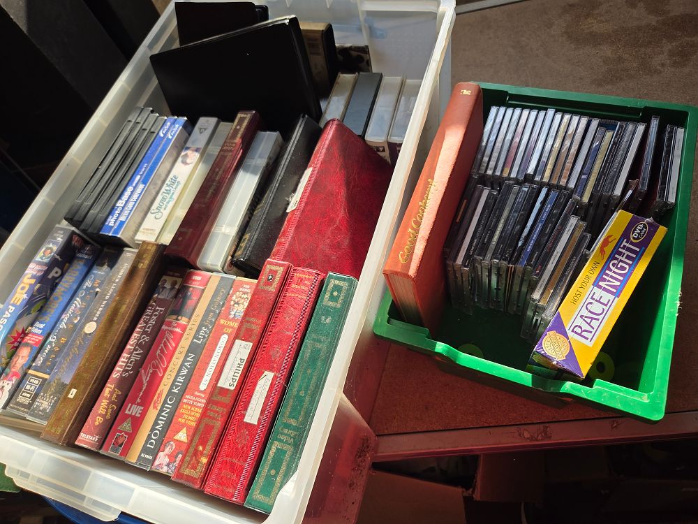 Lot 157 – A Large Mixed Media Collection of CDs, VHS Tapes, and a DVD Game