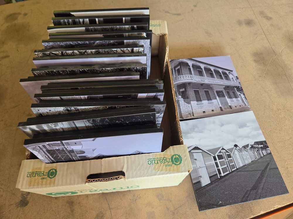 Lot 182 – A Collection of Contemporary Black and White Photographic Prints Mounted on Blocks