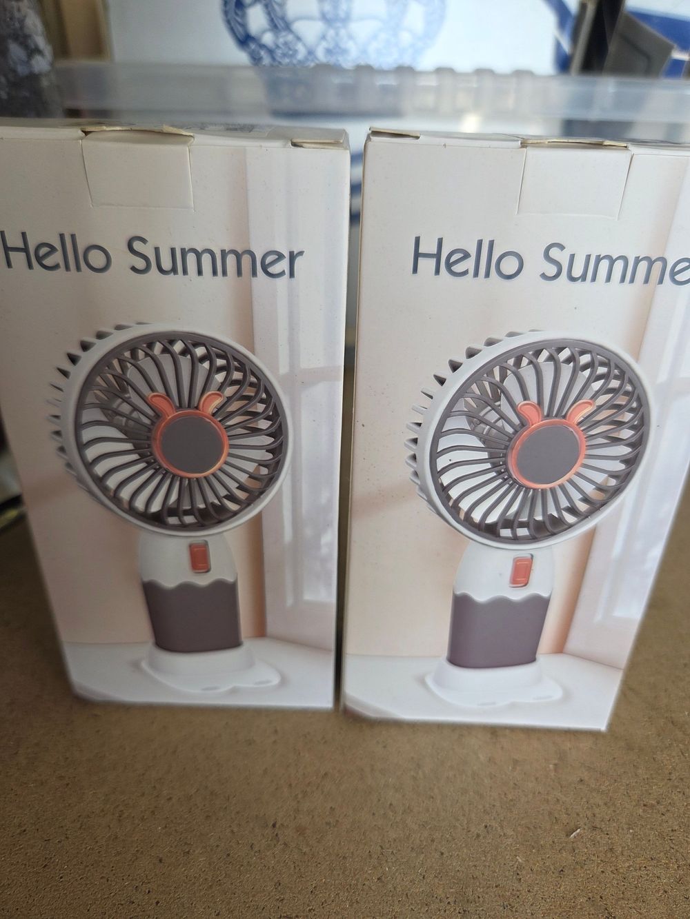 Lot 222 – A Pair of Hello Summer Portable USB Rechargeable Handheld and Desk Fans