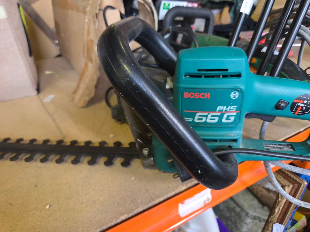 Lot 297 – Bosch PHS 66 G Corded Electric Hedge Trimmer powers on