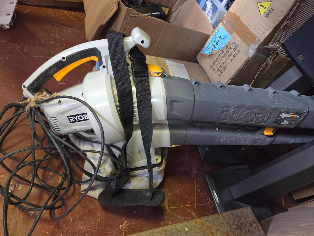 Lot 308 – Ryobi Corded Electric Leaf Blower and Vacuum with Collection Bag powers on