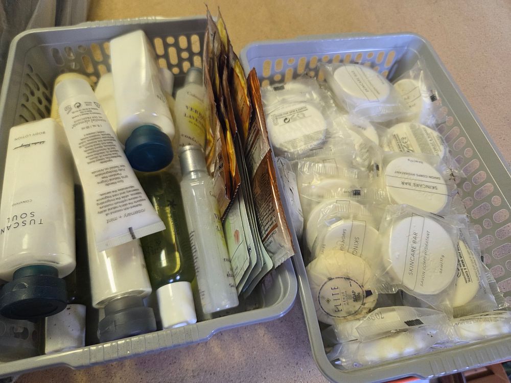 Lot 319 – Two Baskets of Luxury Hotel Toiletries and Amenities Including Salvatore Ferragamo and Gilchrist & Soames