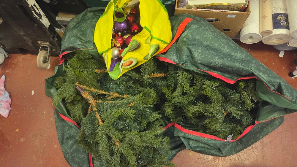 Lot 207 – A Disassembled Artificial Christmas Tree with an Assortment of Festive Ornaments and a Storage Bag