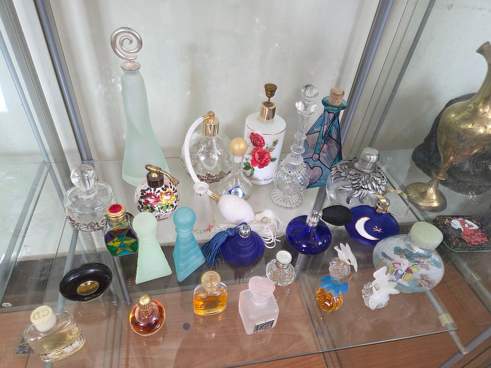 Lot 617 – A Collection of Twenty-Five Vintage and Contemporary Perfume Bottles and Vanity Containers Including Nina Ricci, Bourjois, and Christian Dior