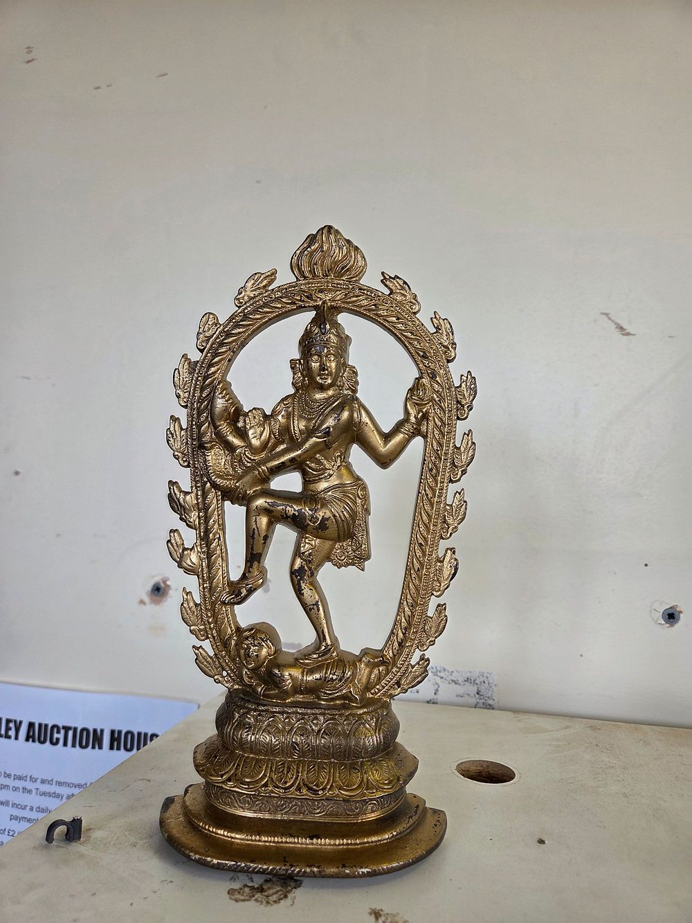Lot 625 – A Cast Brass and Gilt-Toned Statuette of Shiva Nataraja